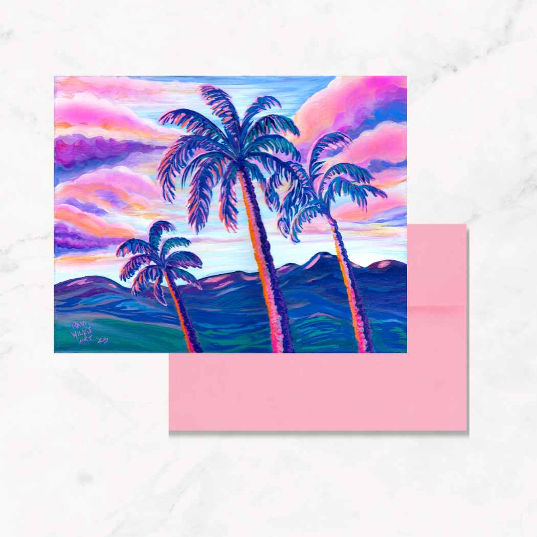 Painting of colorful palm trees and a pink sunset with the background of desert mountains.